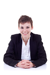 Image showing business woman behind the desk