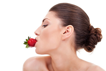 Image showing  sexy woman with strawberry in mouth