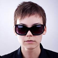 Image showing woman face in dark sunglasses 