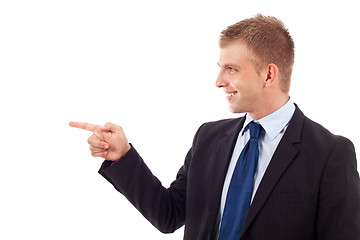 Image showing business man pointing to his side