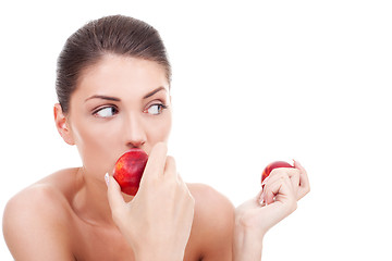 Image showing woman eating peaches