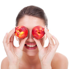 Image showing woman with red peaches 