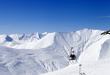 Image showing Skiers on ropeway at ski resort Gudauri