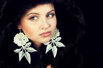 Image showing Glamour young woman wearing fur hat