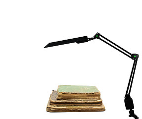 Image showing Retro book and modern lamp