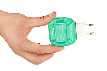 Image showing electric device for protection against mosquitoes in hand