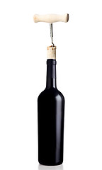 Image showing Opening bottle of wine