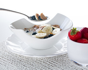 Image showing Breakfast of bran flakes blueberries