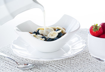 Image showing Breakfast of bran flakes blueberries