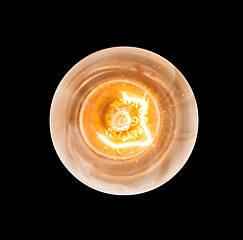 Image showing Incandescent light bulb lit from above