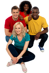 Image showing Group of friends sitting on floor