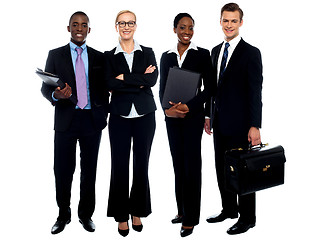 Image showing Happy smiling business team standing in a row