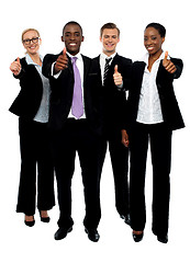 Image showing Business team people group gesturing thumbs up