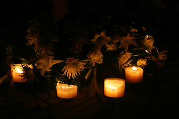 Image showing Candles and flowers