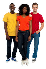 Image showing Trio of casual young friends posing in style