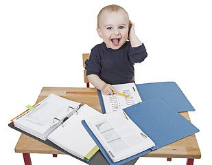 Image showing young child at writing desk