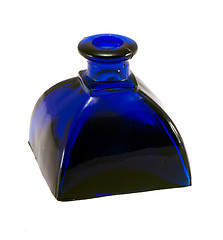 Image showing vintage blue glass bottle isolated on white 