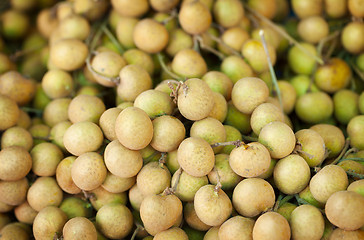 Image showing Longan fruit on the counter of the Asian market