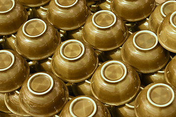 Image showing Brown bowls on counter