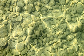 Image showing Stony pebbles underwater on lakebed