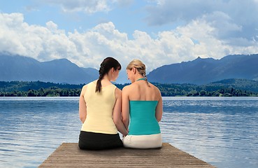 Image showing Two Women on a lake