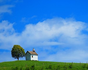 Image showing Quaint little chapel on lush hilltop