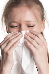 Image showing Pale Woman Sneezing