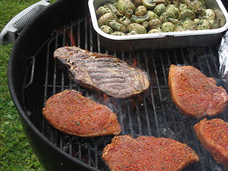 Image showing Barbecue chops and mushrooms