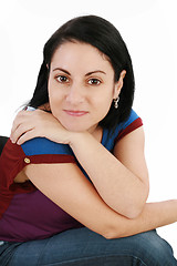 Image showing Portrait of a beautiful young woman looking at the camera and sm