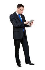 Image showing Young businessman with a Tablet PC