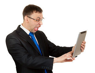 Image showing businessman with a Tablet PC hamming