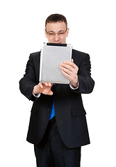 Image showing Young businessman with a Tablet PC