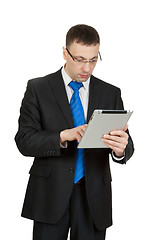 Image showing Young businessman with a Tablet PC