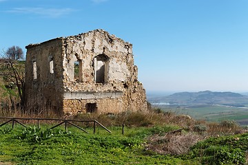 Image showing Farmhouse ruin among rural landscape