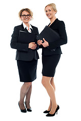 Image showing Aged businesswomen posing with documents