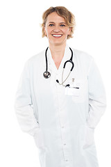 Image showing Beautiful female physician in white uniform