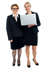 Image showing Senior businesswomen posing with laptop