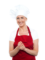 Image showing Beautiful female cook looking at you
