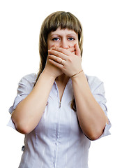 Image showing young girl covers her mouth with his hands