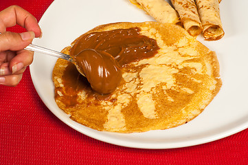 Image showing Filling a pancake