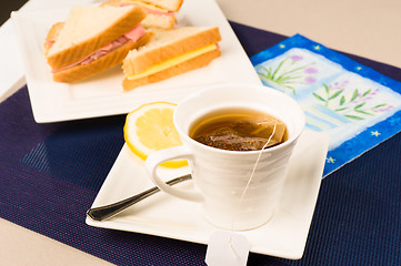 Image showing Tea and sandwiches