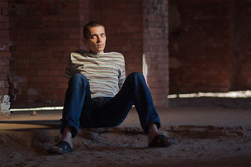 Image showing Thoughtful man sitting