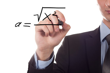 Image showing Teacher writing a mathematical equation