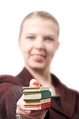 Image showing Young businesswoman with books