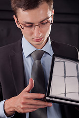 Image showing Businessman with laptop