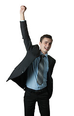 Image showing Excited young man celebrating success