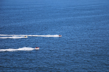 Image showing Competing boats on the sea