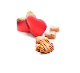 Image showing heart shaped cream cookies on red heart metal box