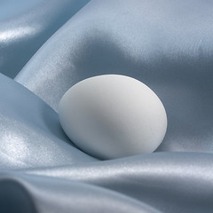 Image showing egg in blue satin