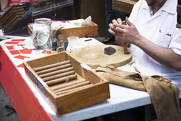 Image showing Rolling cigars